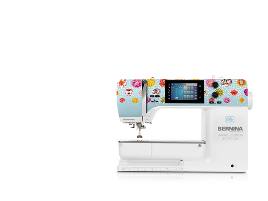 BERNINA 570 QE sewing and quilting machine front view with colorful Tula Pink design and touchscreen, showing spacious free arm and stitch plate image number