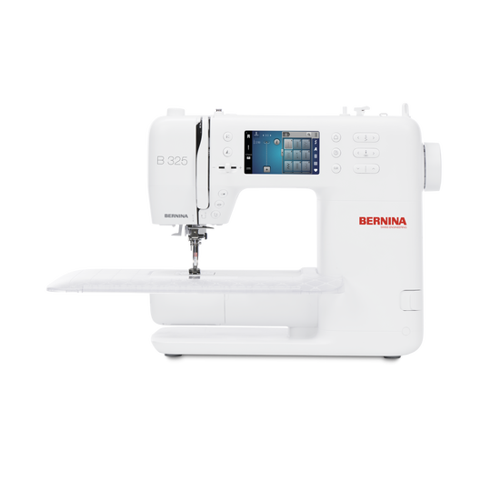 BERNINA 325 sewing machine front view with extension table, free arm and LCD screen, showing compact computerized design for precise stitching image number