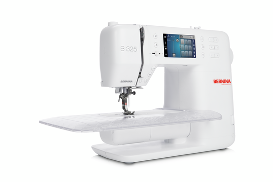 BERNINA 325 sewing machine on extension table, showing free arm, presser foot and LCD screen for practical, precise everyday sewing. image number
