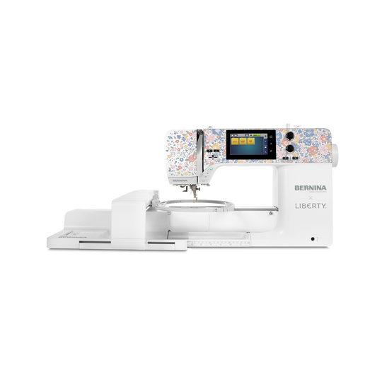 BERNINA 580 Limited Edition sewing and embroidery machine shown front view with embroidery module and color touchscreen display image number